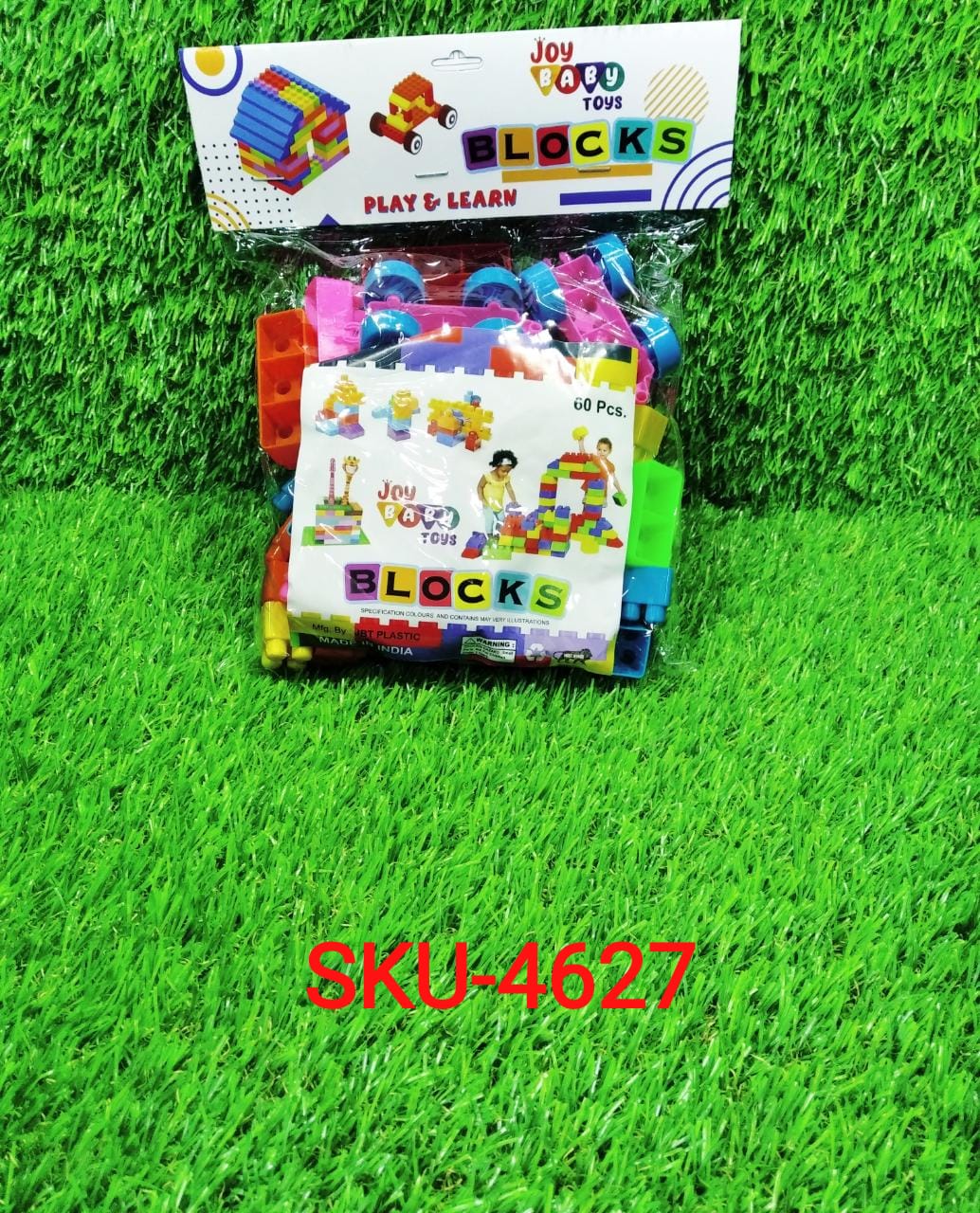 A child's hands actively playing with educational building blocks, fostering creativity.
