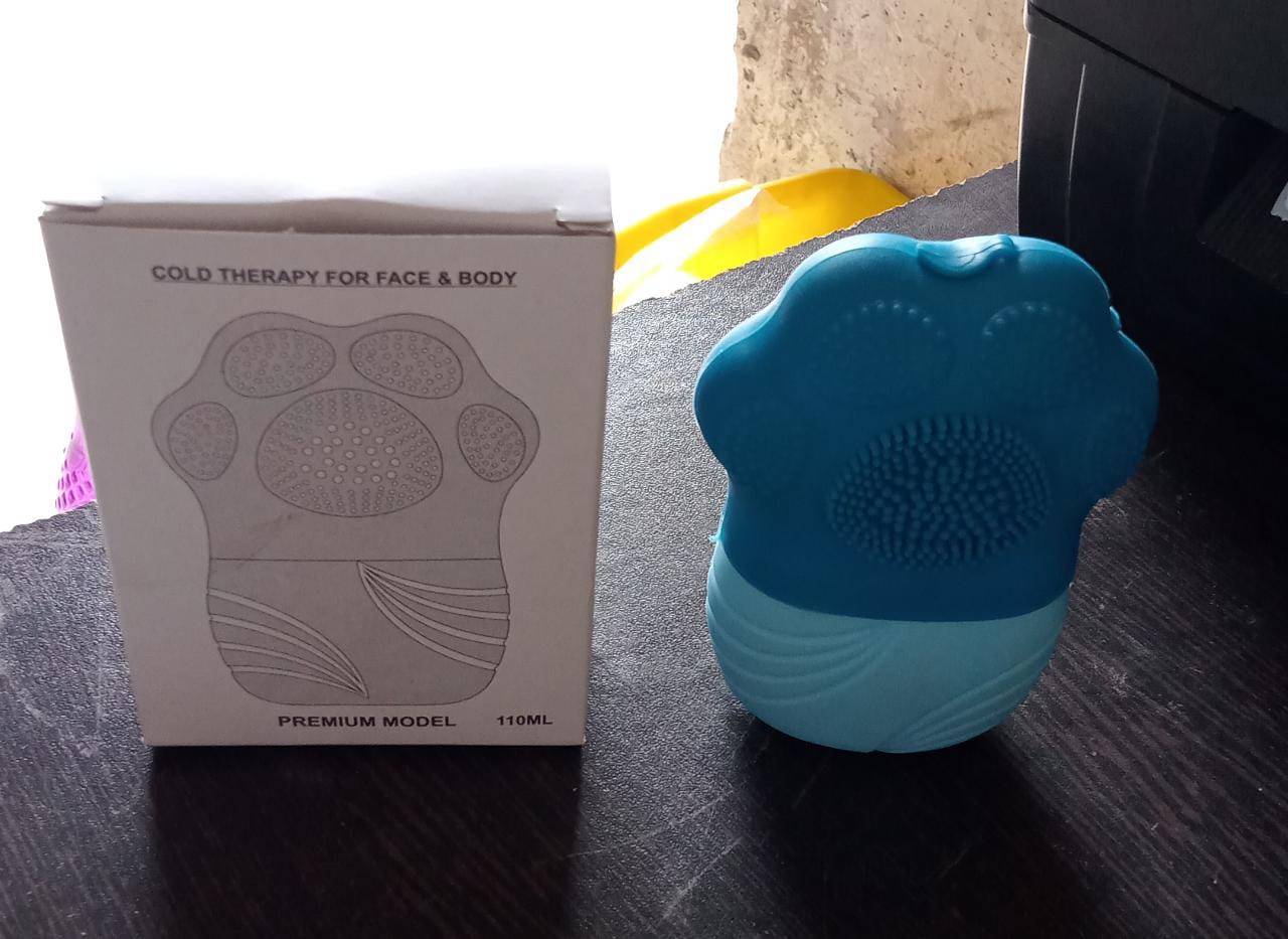 Silicone ice roller for face demonstrating its compact, travel-friendly size.