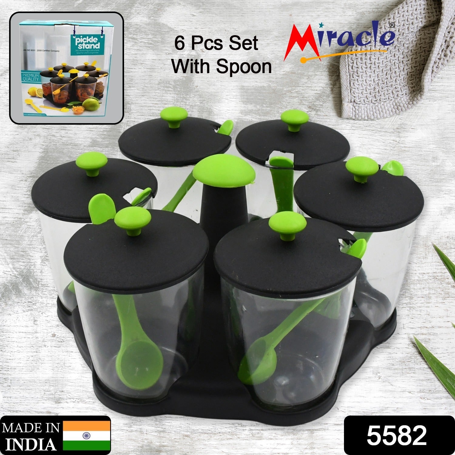 Top-down view of the revolving spice rack, showcasing its sleek design and six clear jars.