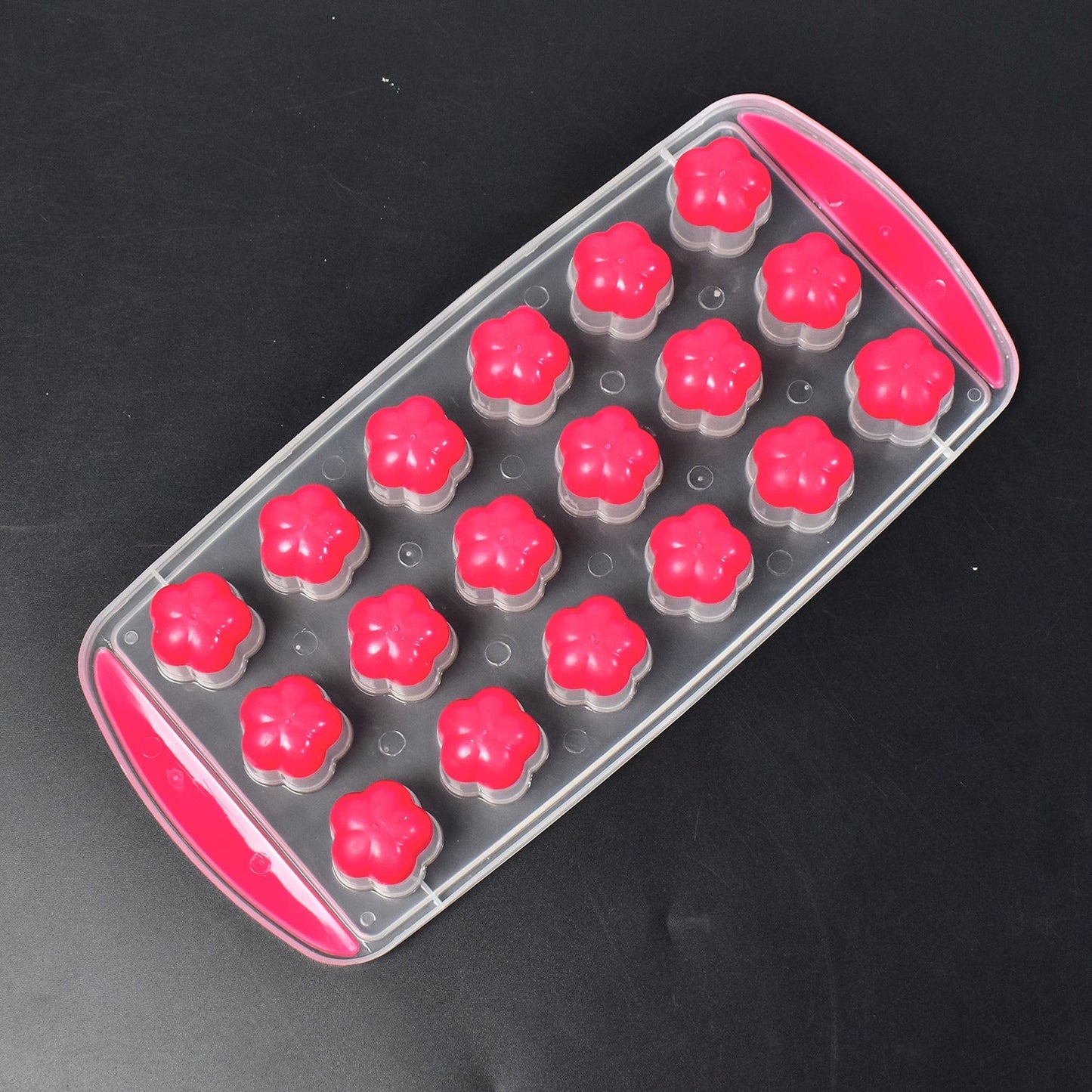 Angled view of the flexible silicone flower ice tray showcasing its unique cavities.
