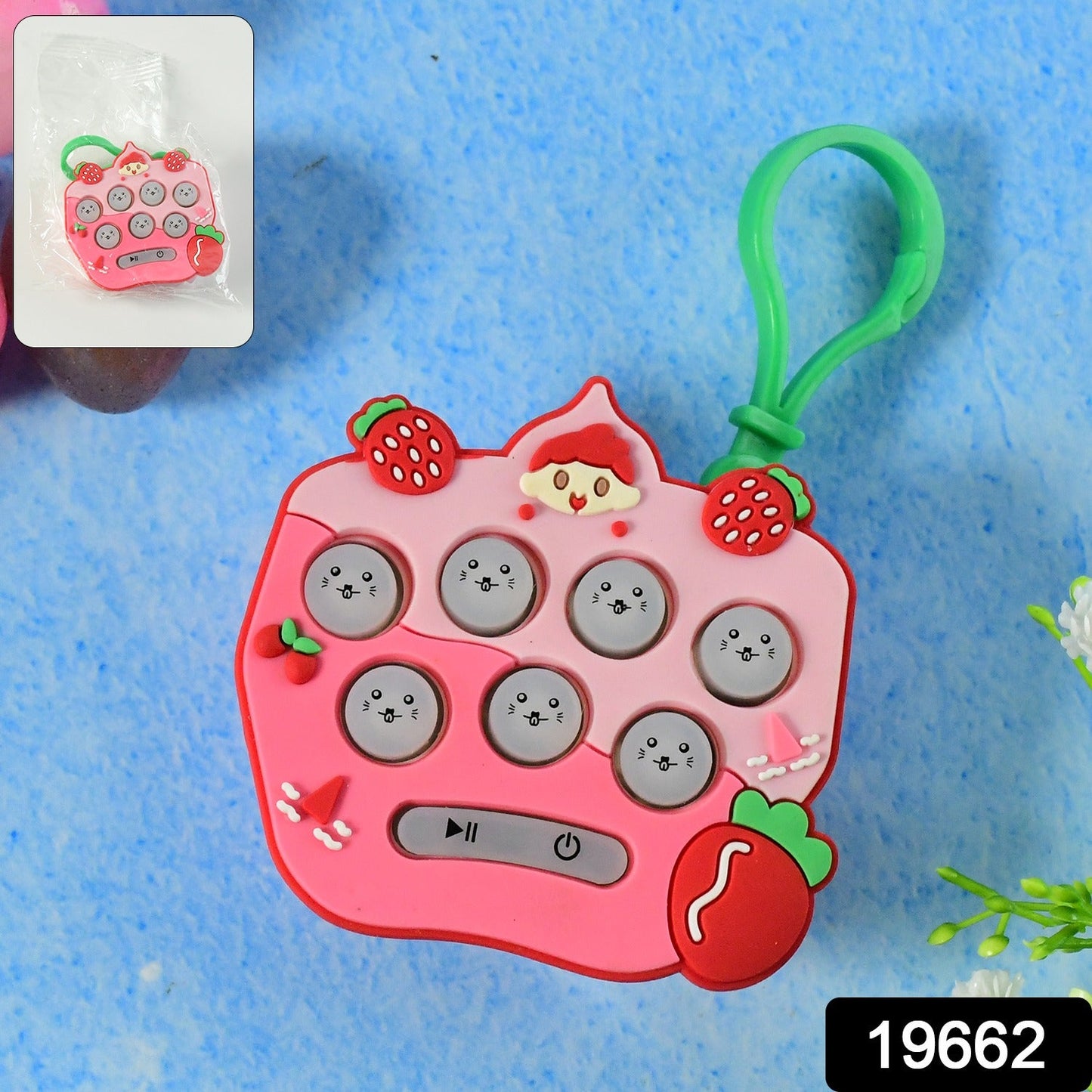Close-up of fun popper bubbles on the strawberry keychain toy