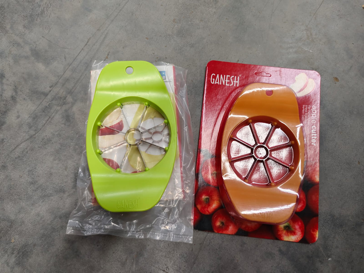 Multiple Ganesh Apple Cutters in various colors, ready for use.