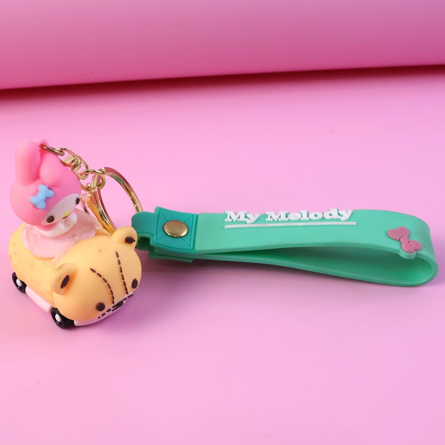 Cartoon character keychain with silicone strap and mini toy charm