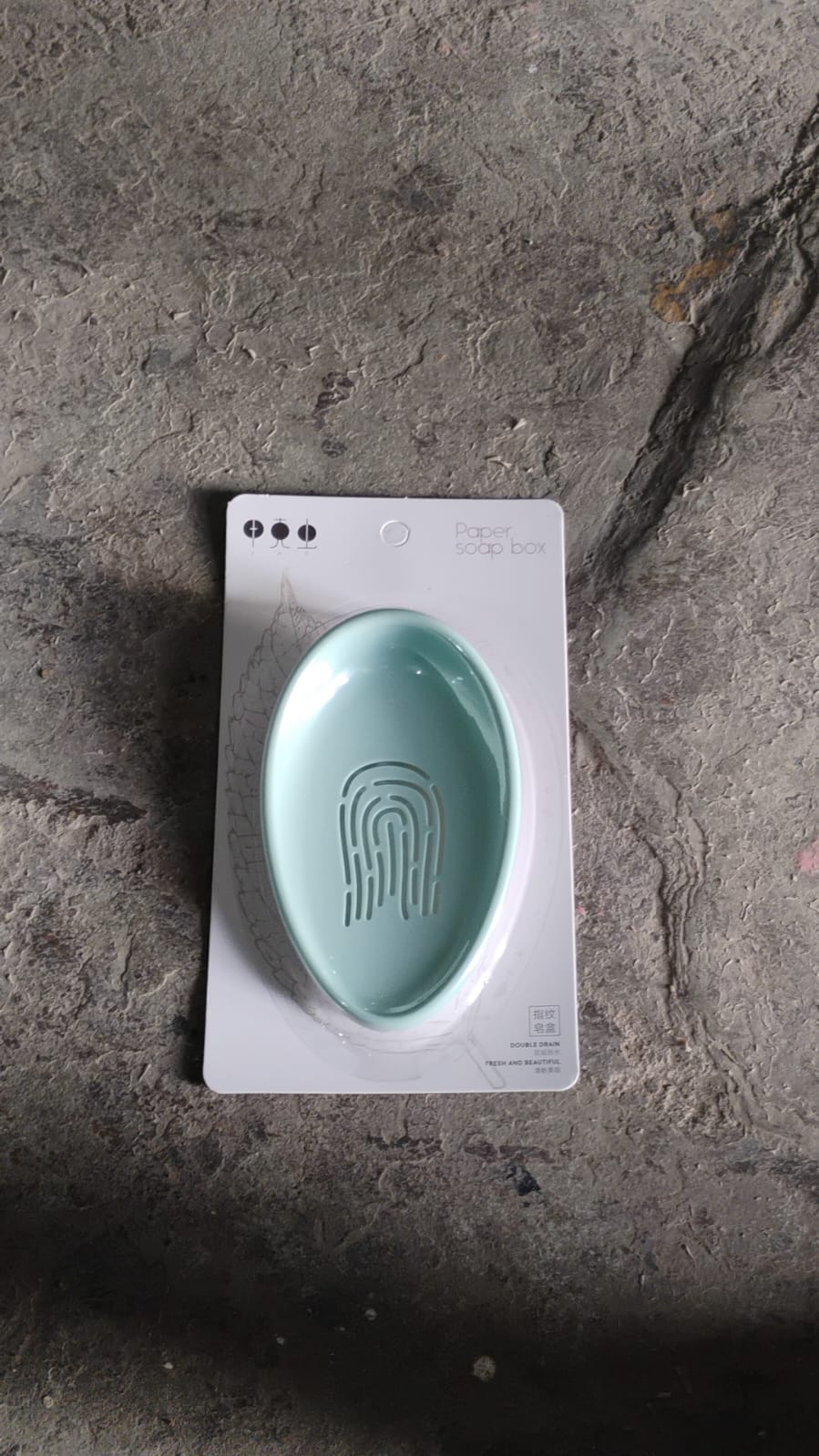 Side profile of the soap dish with drain, showing its two-tier structure and minimalist aesthetic.