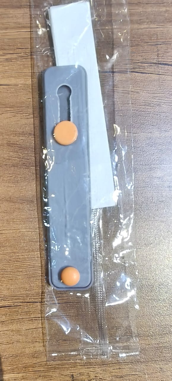 Phone loop finger holder in use demonstrating secure grip