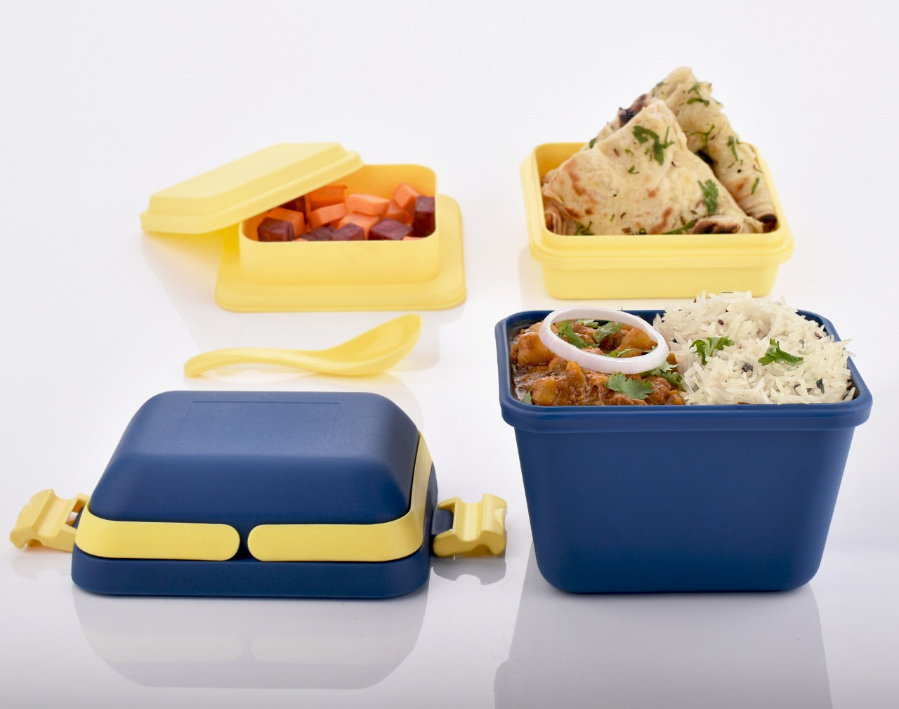 Blue 3-compartment airtight lunch box with ergonomic handle & secure push lock.