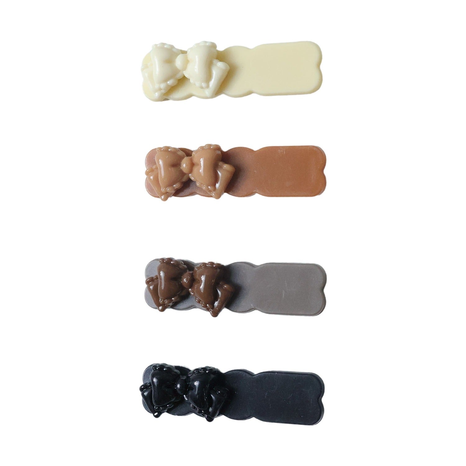 Decorative bow hair clips included in stylish snap clip set
