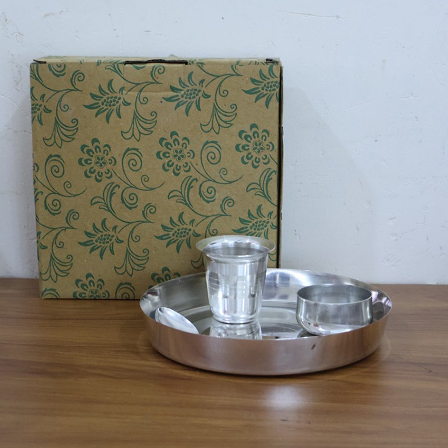 Stackable stainless steel katori bowls and glasses for space-saving storage.