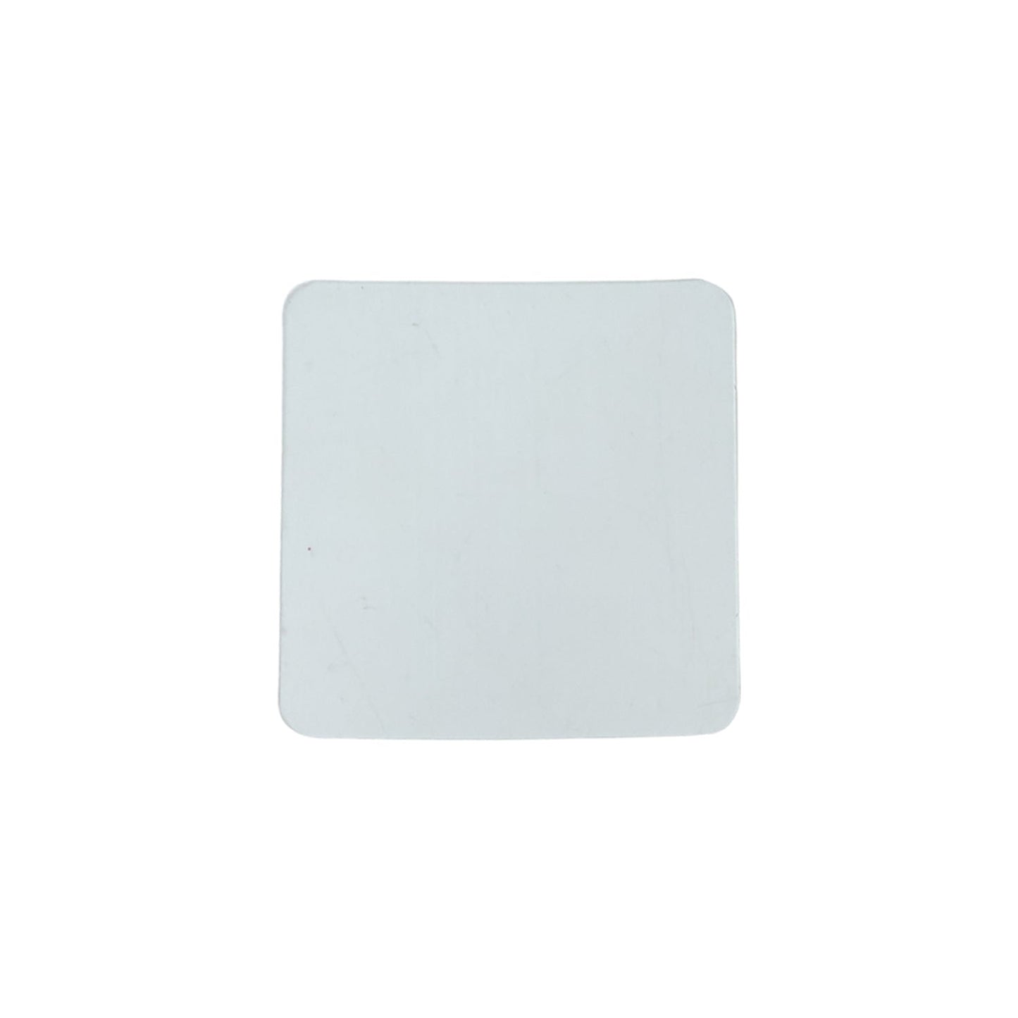 Flat lay of transparent square nano adhesive tape pads