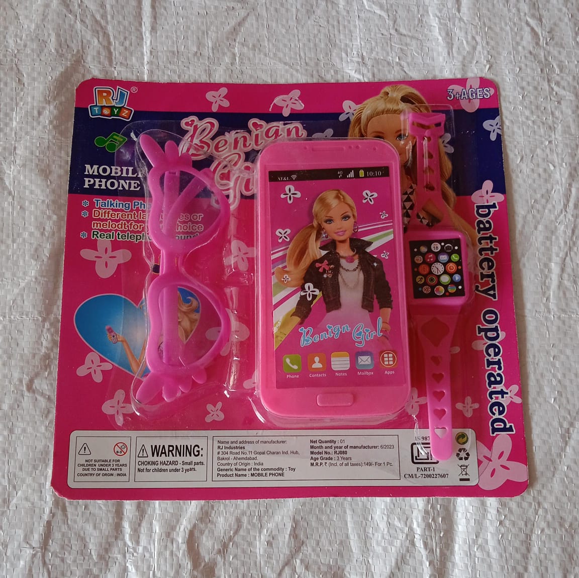 Another angle of the complete Barbie musical phone, watch, and glasses play set.