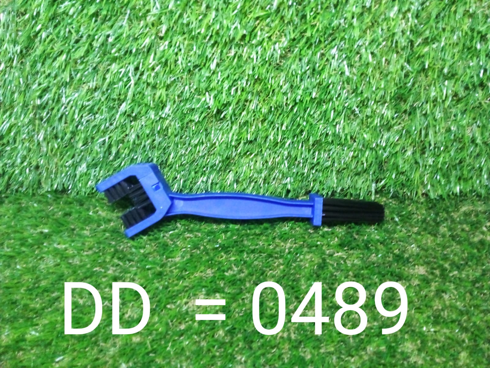 Motorbike chain cleaner tool displayed from various angles, showcasing its design.