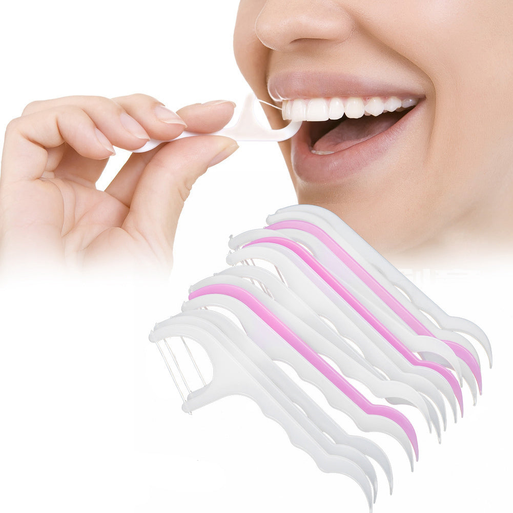 Close-up view of a dental floss pick demonstrating easy tooth cleaning.