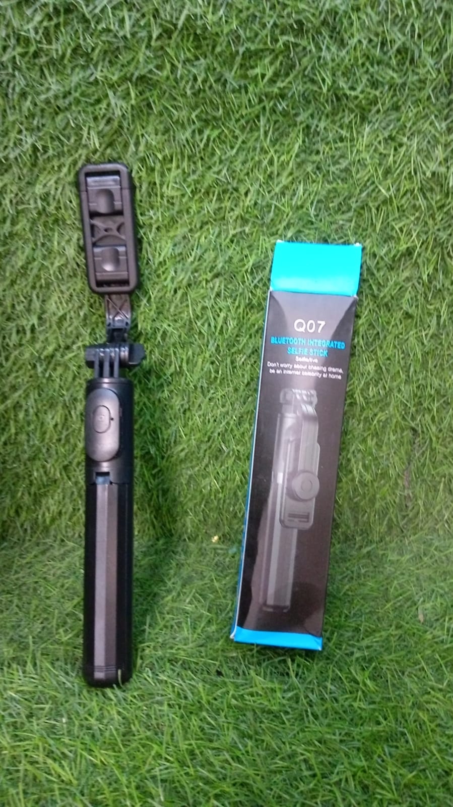 Sleek Bluetooth selfie stick and tripod combo, perfect for travel vlogging.