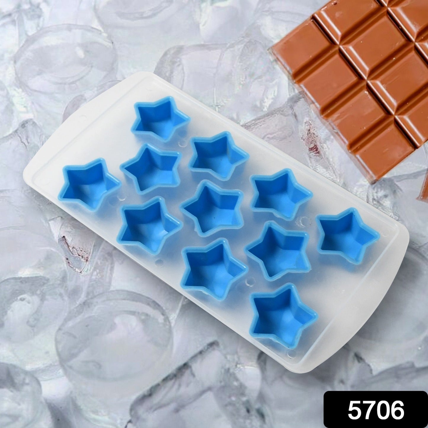 Close-up of a flexible silicone mold, showing perfectly formed fruit-shaped ice cubes ready for release.