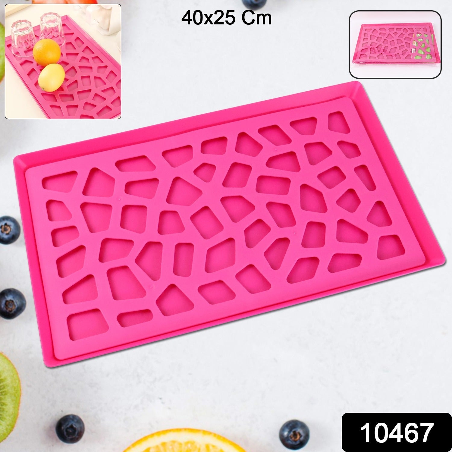 Close-up of plastic kitchen tray with stylish hollow cut-out pattern for draining