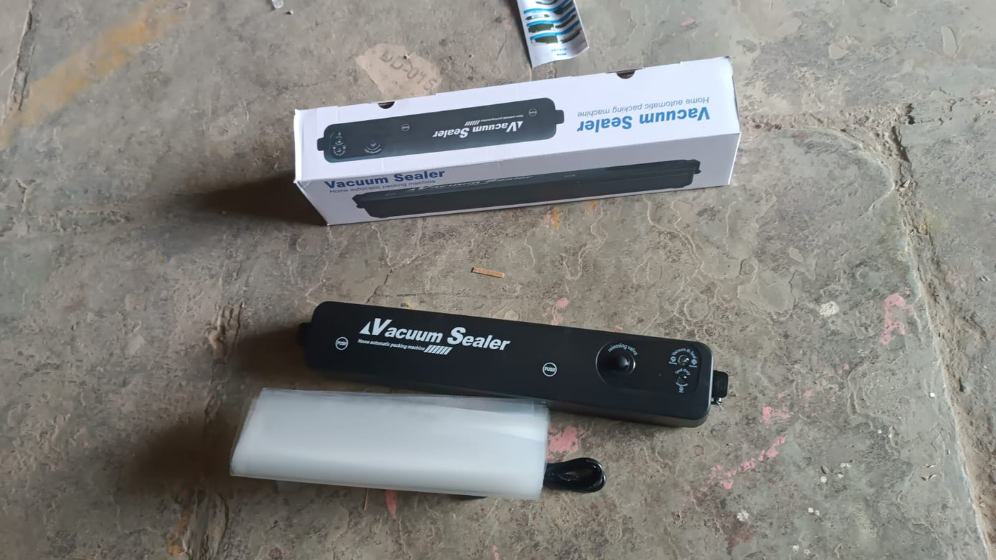 Retail packaging of the Tidy Table Automatic Vacuum Sealer Machine.