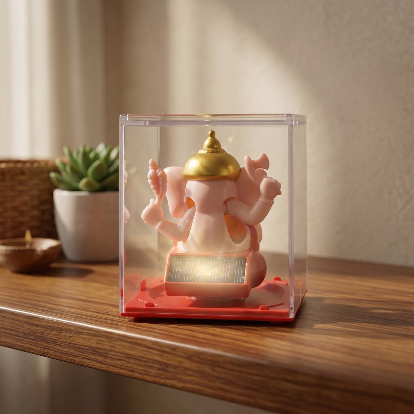 Alternate angle of hand-moving small Ganesha idol with vibrant finish
