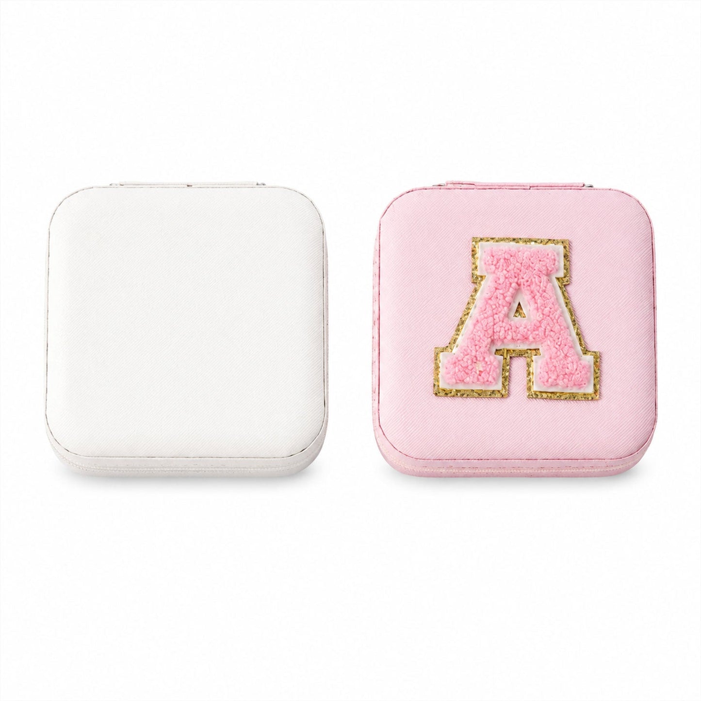 The LilyGleam travel jewellery box placed next to travel essentials like a passport and sunglasses.