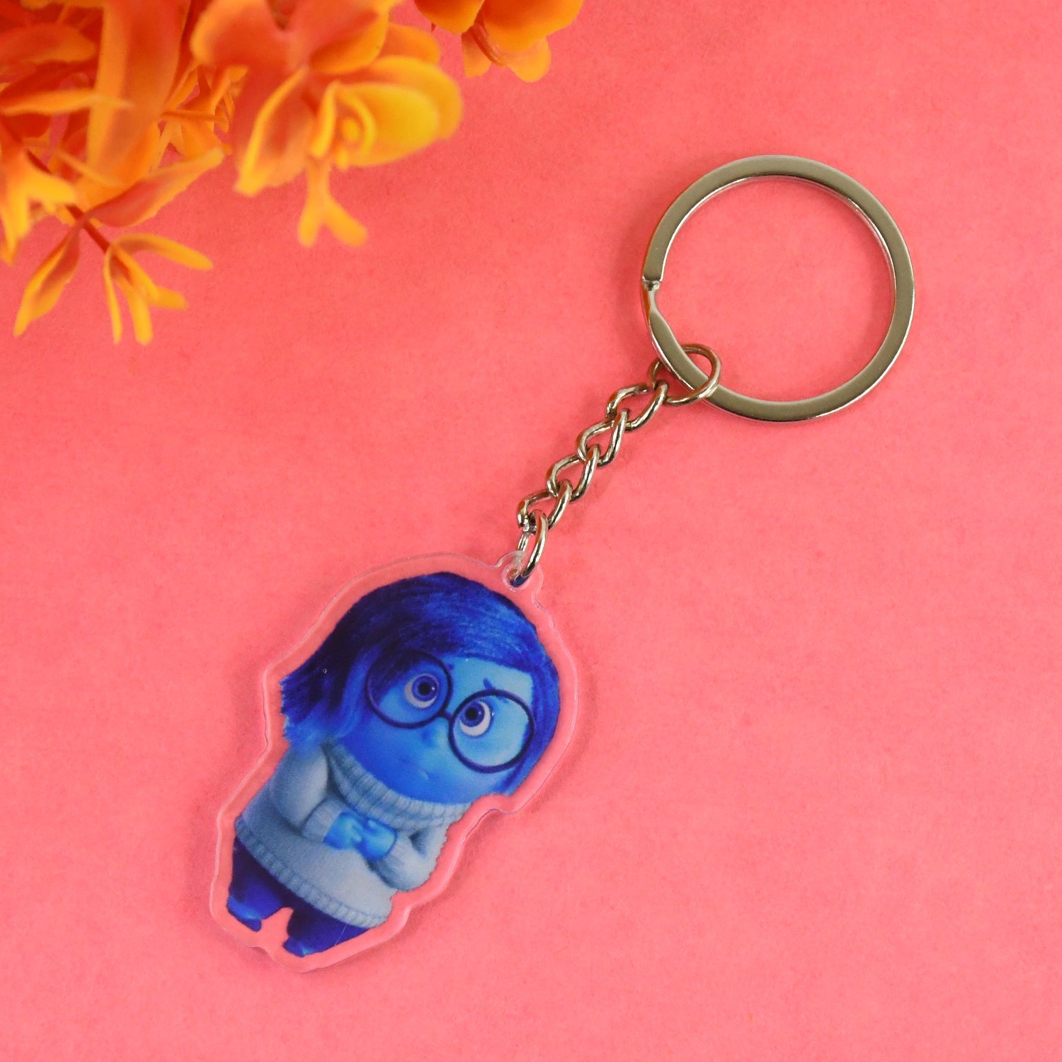 Compact pocket size cartoon acrylic keychain with sturdy metal ring