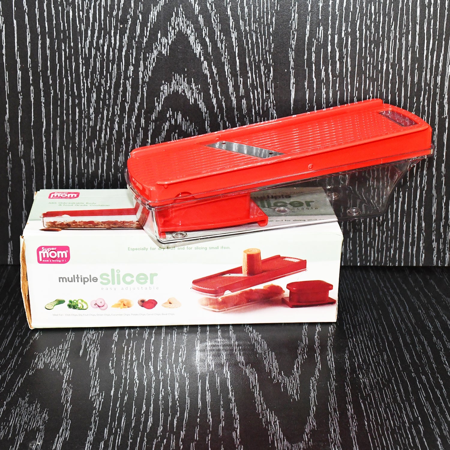 Close-up of vegetable and dry fruit slicer with adjustable settings