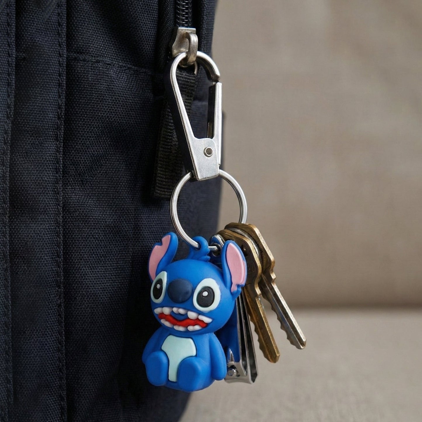 Detail of mixed cartoon designs on the mini nail clipper keychain
