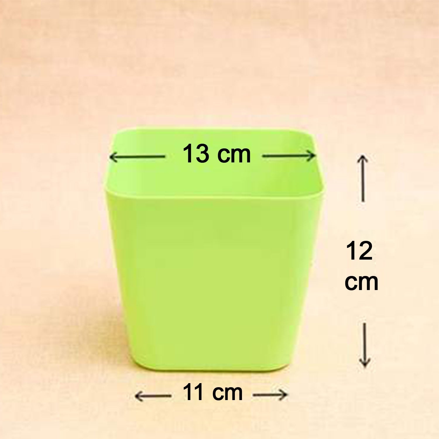 Green square flower pots, perfect for adding a pop of colour to any space.