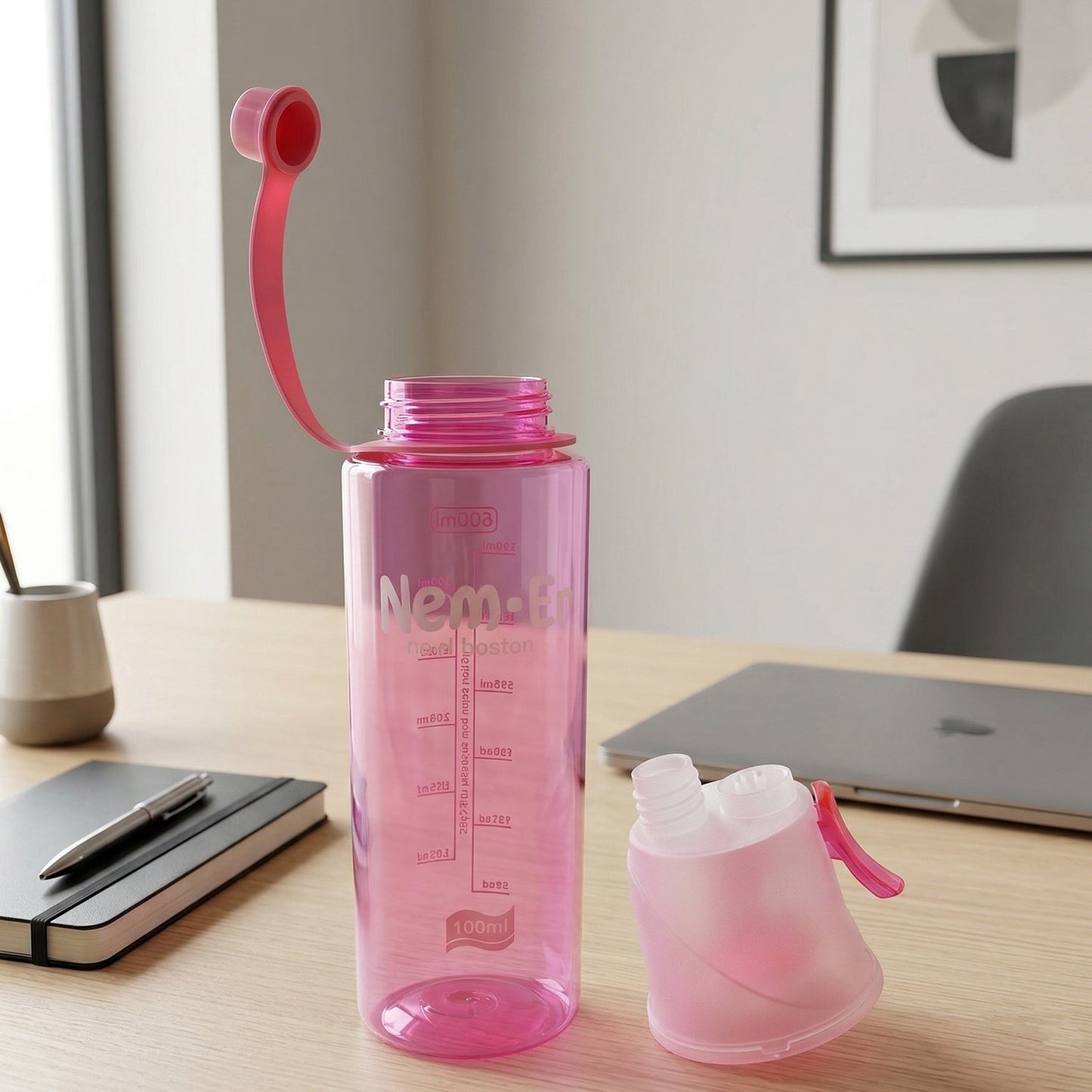 Pink sports water bottle with easy-carry loop attached
