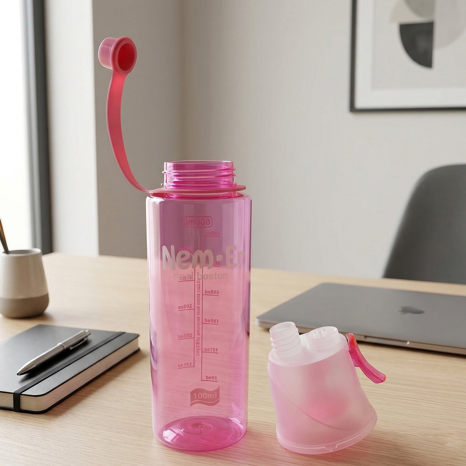 Pink sports water bottle with easy-carry loop attached
