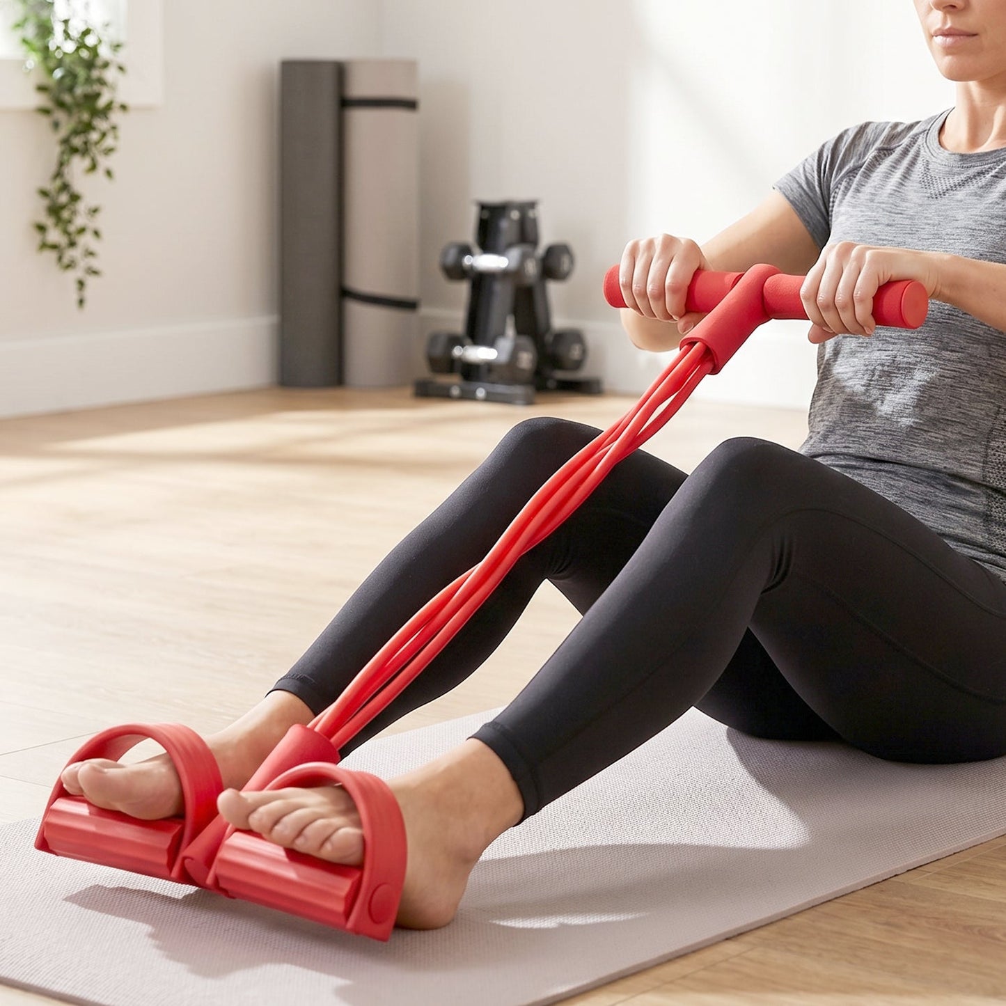 Pull Rope Exerciser with elastic resistance ropes and foam handles for versatile fitness workouts.