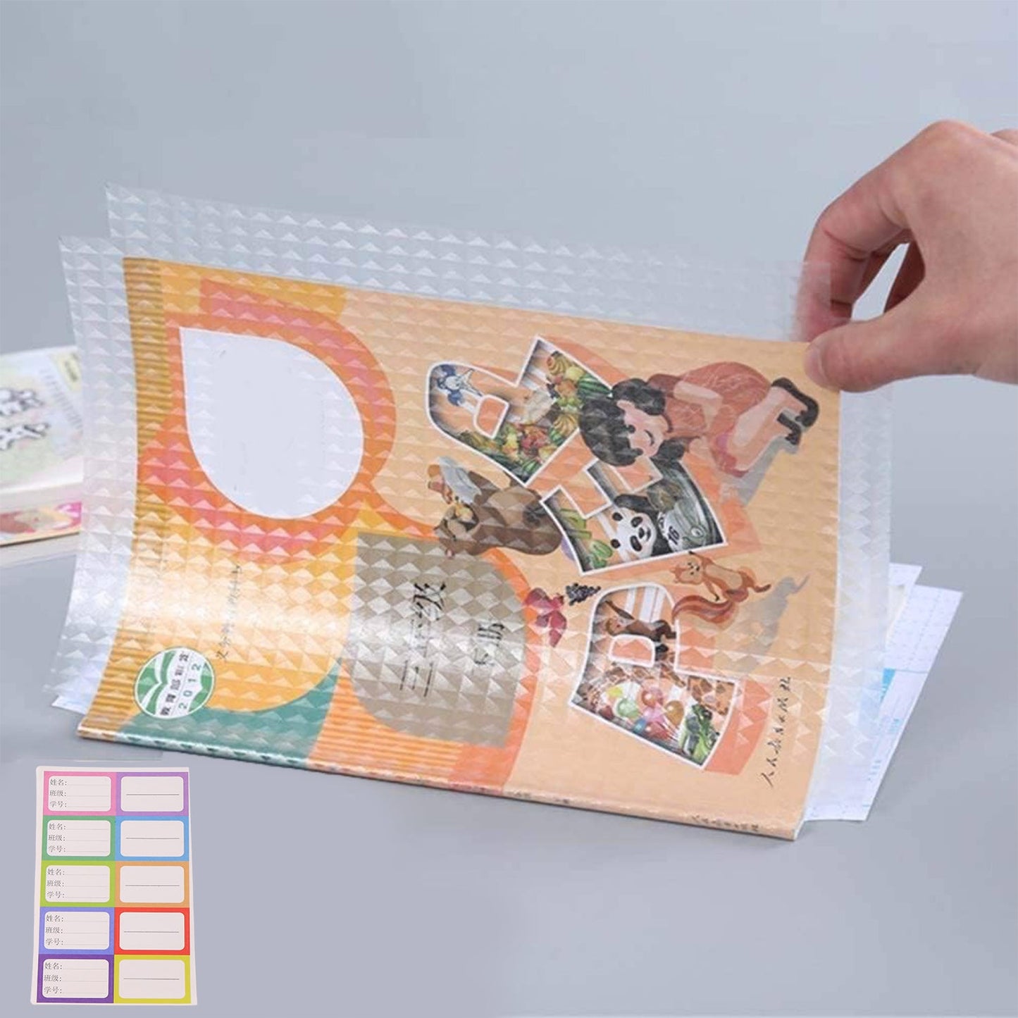 Transparent adhesive book cover sheets in various sizes for different books