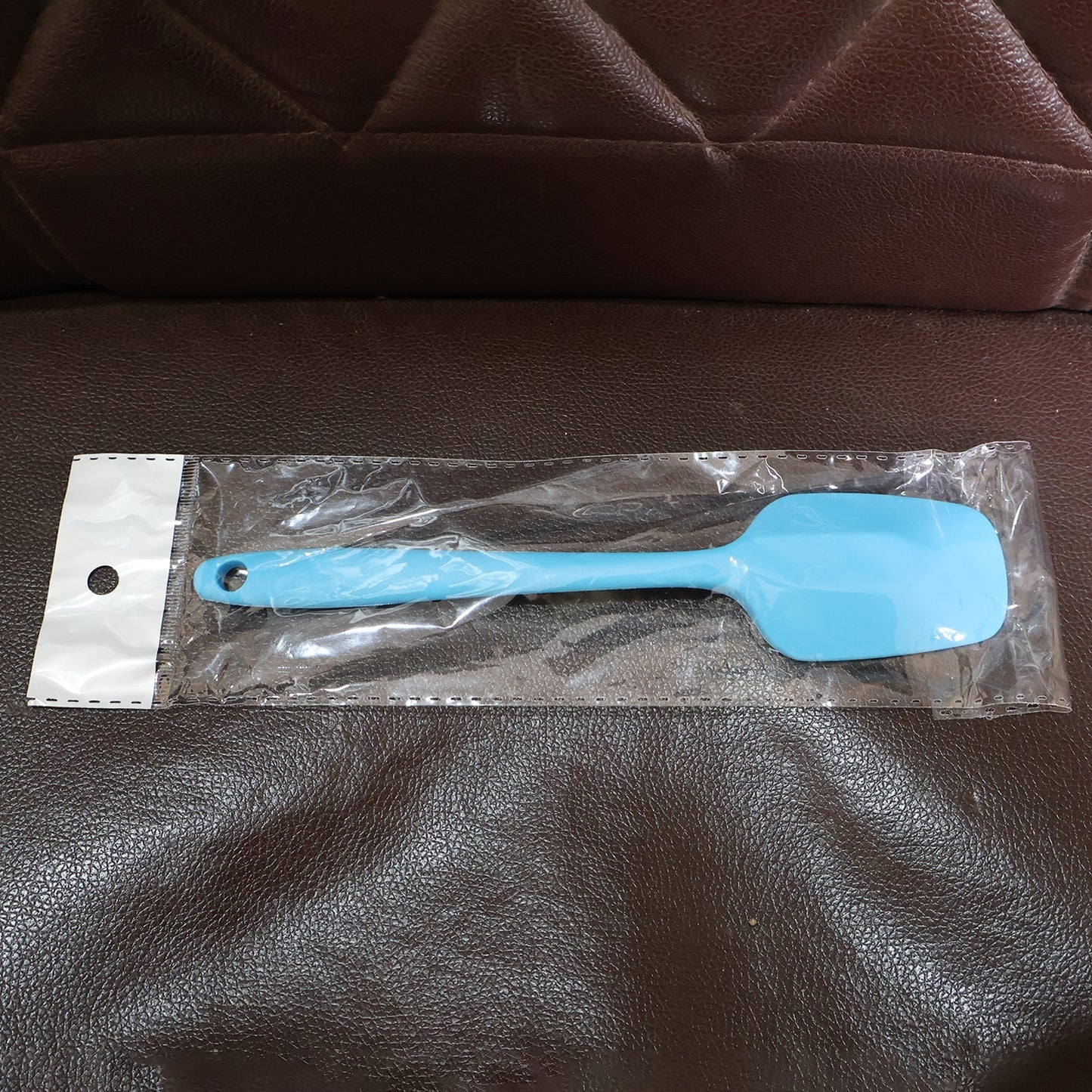 Flexible silicone kitchen spatula with ergonomic handle