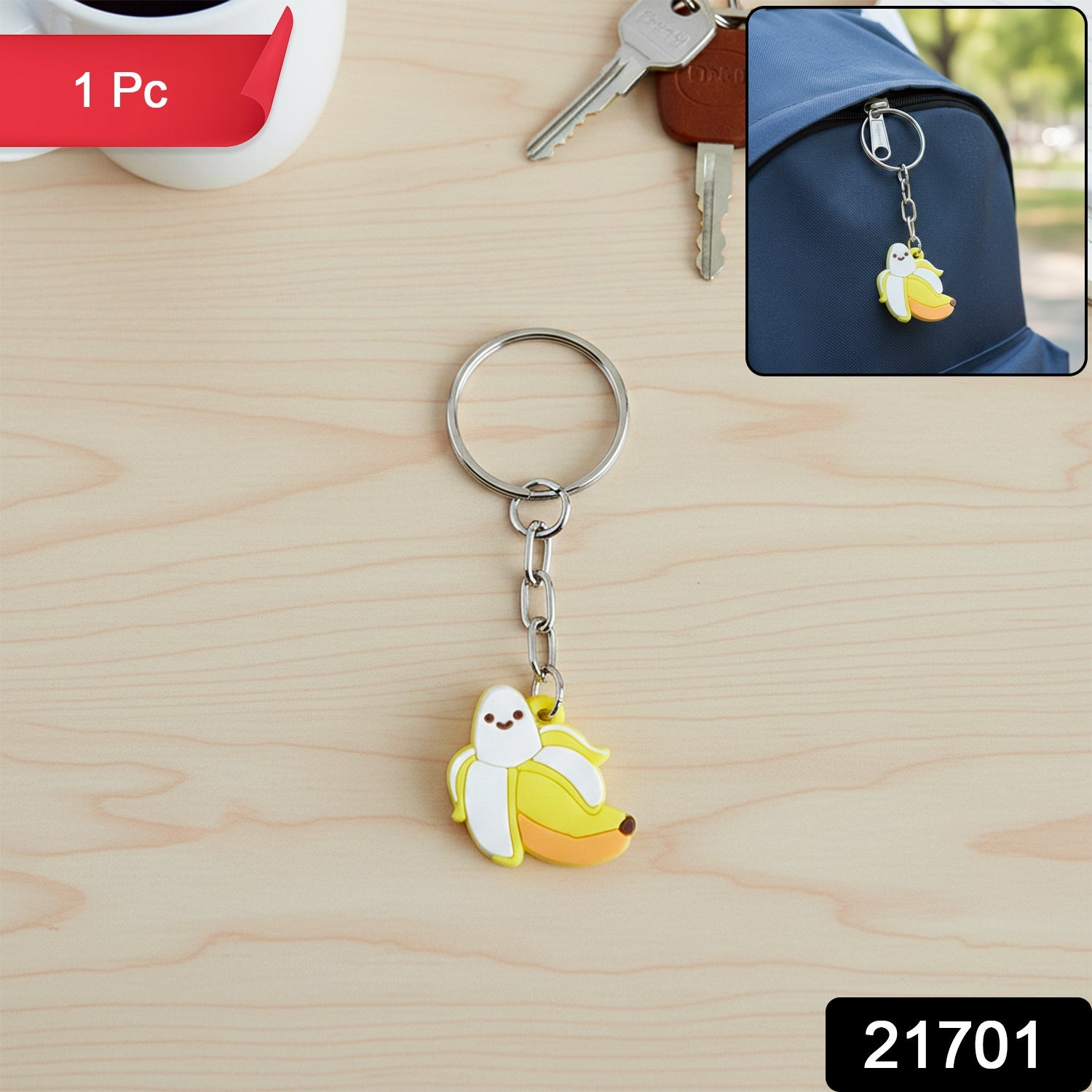 Banana shape cartoon keychain attached to a bag zipper with metal ring