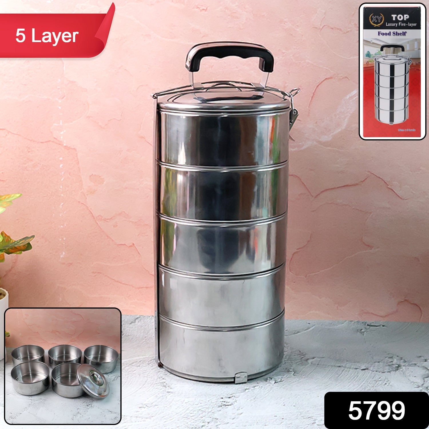 Overhead view of the five distinct compartments inside the tiffin box.