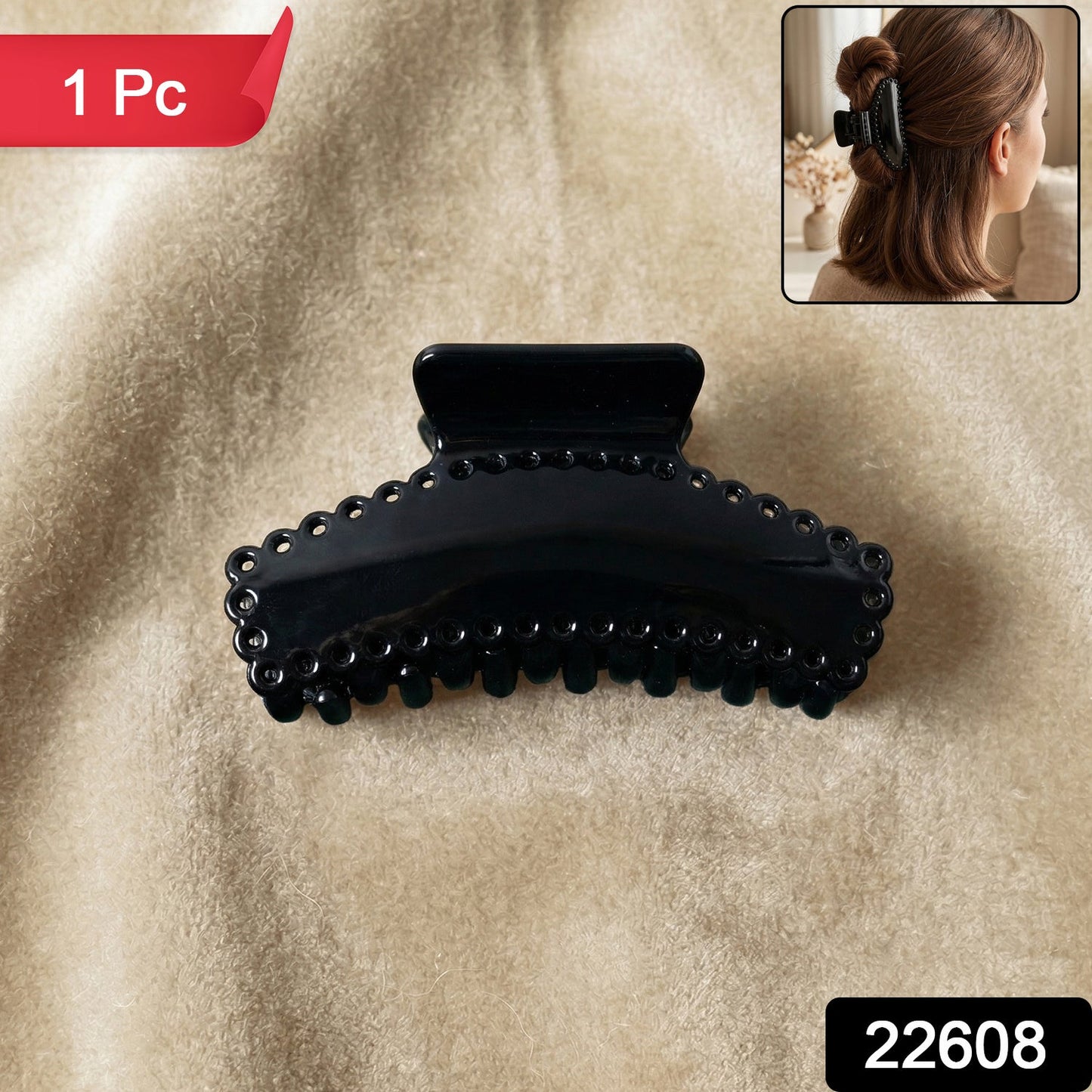 Black hair claw clip shown on a clean background, stylish and functional