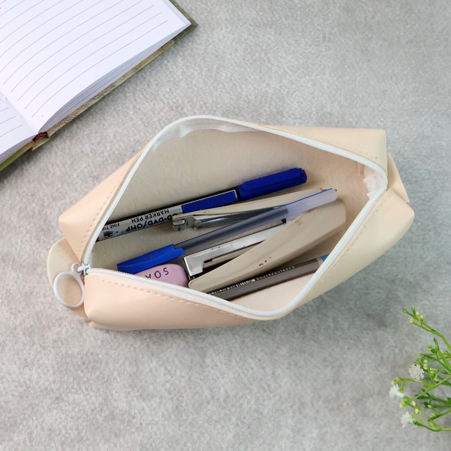 Stylish PU leather stationery case with durable stitching and a compact design.